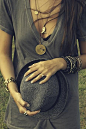 The bracelets on the left hand might be a bit much for me, but I really like this look. The hat definitely...