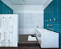 Example of a mid-sized trendy master blue tile and glass tile ceramic floor bathroom design in Austin with blue walls