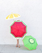 Add some color to your rainy day with a DIY fruit slice umbrella.