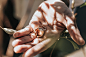 person holding bridal ring set