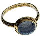 A woman’s “memorial poesy ring” from 1592, made of gold and rock crystal. On the ring’s inner surface is inscribed, “The cruel seas, remember, took him in November.”