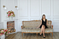 Free photo young attractive woman posing in sofa