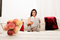 Young beautiful woman sitting on the couch by Michael Osterrieder on 500px