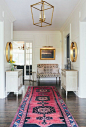 bold print rug in entryway: 