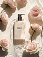 An elegant woman in a high-fashion pose, as if on the cover of Vogue. She wears a luxurious dress entirely made of beautiful, vibrant spring flowers--petals flowing seamlessly, creating a voluminous yet delicate silhouette. The atmosphere is fresh and ful