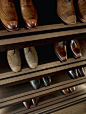 Shelving detail from bespoke joinery, wardrobe in dressing room of grade-listed townhouse in Knightsbridge. Show strorage ideas