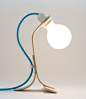 Table lamp made in curved solid chestnut wood : Table or desk lamp made ​​of solid chestnut wood curved through the traditional technique of steam bending. Lamp base in a natural, simple, clean and timeless nordic style, mixed with a white balloon lightbu