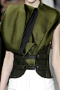 Sumptuous Folds - elegant olive green dress with layered  folded construction + wide green leather belt; fashion details: