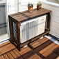 This cover for the outside unit of a ductless system doubles as a table top. But most importantly, allows great air flow, nothing to restrict the fan from blowing, excellent choice.