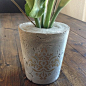 Decorative Concrete Vase (this looks simple--ice cream container as outside mold, multiple plastic choices for inside form, which you'd want to leave in, then stencil for the decoration--you could tint the concrete, too)