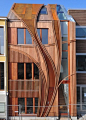 Leiden, South Holland, the agencyarchitecture Rotterdam 24H Architecture has created these two townhouses with stunning wood-clad facades, uniquely contemporary Art Nouveau style. The natural influence continues inside where organic and floral motifs ador