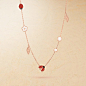 Lucky Spring long necklace, 15 motifs, rose gold, carnelian, mother-of-pearl, onyx. Lucky Spring collection, Van Cleef & Arpels