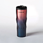 A stainless steel tumbler with a unique ripple shape and a gradient finish. Part of the Cherry Blossom Drinkware Collection.