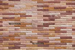 现代旧棕色砖墙图案。