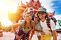 tourists posing in front of temple in koh samui thailand