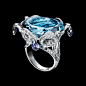 Limelight 刺绣图案指环，18K白金，镶衬单颗椭圆形湖水蓝黄晶(约36克拉）， 4颗梨形紫色蓝宝石（约2.5克拉）及273颗圆形美钻（约2.8克拉）