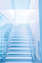 a image of stairs leading up to a large space, in the style of light white and light azure, ethereal transparency, illusionary architectural elements, installation creator, dystopian atmospheres, bauhaus functional design, light cyan and amber