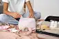 Front view woman packing small bag