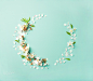 Flat-lay of white almond blossom flowers wreath