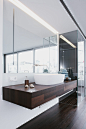 Open Bedroom/Bathroom. Suspended sleek vanity unit with flash fitted mirror cabinet and concealed LED lights.