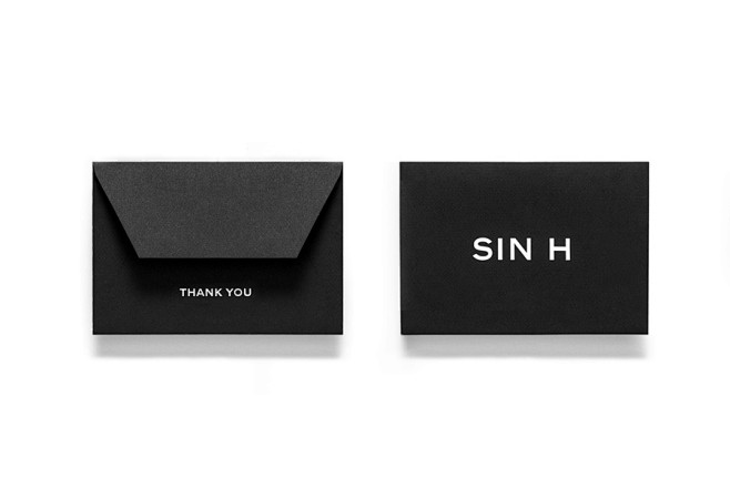 SIN H时尚服饰品牌简洁大气的黑白配色...