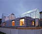 House in Yamasaki with rooftop sheds by Tato Architects