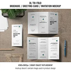 Trifold brochure or invitation mockup still life concept
