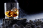 Glass of whiskey in fog .Advertising shotd : Concept advertising alcohol in landscape.Fog