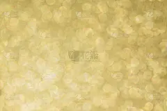抽象散焦背景纹理与金色闪闪发光。节日模糊背景贺卡等设计
