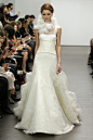 Vera Wang Bridal Fall 2013——Look 8: Corded leaf lace over web lace modified mermaid gown with hand appliqued lace accents and English tulle and horsehair flange at train. Silk organza hand rolled petal corsage at neck. Silk organza corselette at waist. 