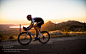 biking into sunset by Christoph Oberschneider on 500px