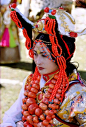 Khampa Girl from Aba Town, Tibet. Photo from BetterWorld2010.