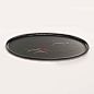 «Glistening black oval tray»