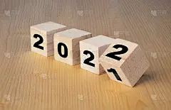 圣诞快乐，新年快乐的概念，翻转的木方块从2021年到2022年变化。