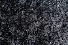 闪亮的黑色天鹅绒织物反射出美丽的光。