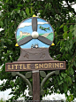 Village sign - Little Snoring, Norfolk, England,  UK: 