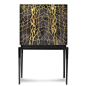 This bar cabinet exhales style, grace and luxury. It is a truly fascinating and exclusive piece, proven to be impressive and eye-catching through its sinuous and elegant lines. The body in mantled in goatskin and has solid brass inlays, finished with a sm