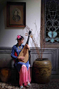 Travel Asian people and national costume Chinese girl playing pipa