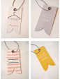 hang tag for different products - pants, buttons ups, skirts etc… maybe in the shape of the thing with logo on?