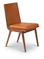 创意单人沙发Legato Dining Chair with solid walnut frame and upholstered seat and back cushions