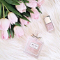 Pretty pink tulips, nail polish and Miss Dior perfume: 