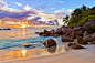 塞舌尔群岛在日落 - 自然背景的热带海滩