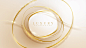 Circle frame and gold ribbon with glitter light effect element. Pastel cream elegant background.
