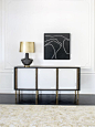 KELLY WEARSTLER | MELANGE CREDENZA. Burnished brass legs and solid, luxe wood with a credenza accented in combed plaster.