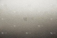 灰色皮革纹理背景。