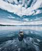 photo-of-boat-under-cloudy-sky-2123573