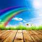 彩虹与草地木板背景图片