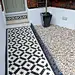 front garden wall painted white metal wrought iron rail and gate victorian mosaic tile path in black and white scottish pebbles York stone balham london (24): 