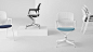 White and black Keyn side chairs, including the stackable model.