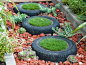 gartenideen mit alten haushaltssachen gartenweg originell reifen rasen saeen rot stein